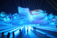 <p>Visitors attend a 3D light show at the Harbin Sun Island International Snow Sculpture Art Expo on Jan. 1. (Photo: Stringer/Reuters) </p>