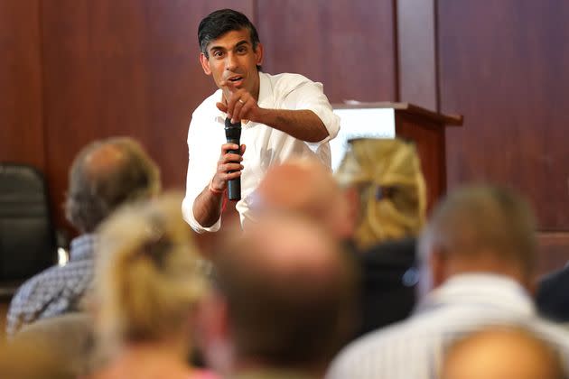 Rishi Sunak talking to a group of people during a visit to St John's Wood Synagogue, north London. (Photo: Stefan Rousseau via PA Wire/PA Images)