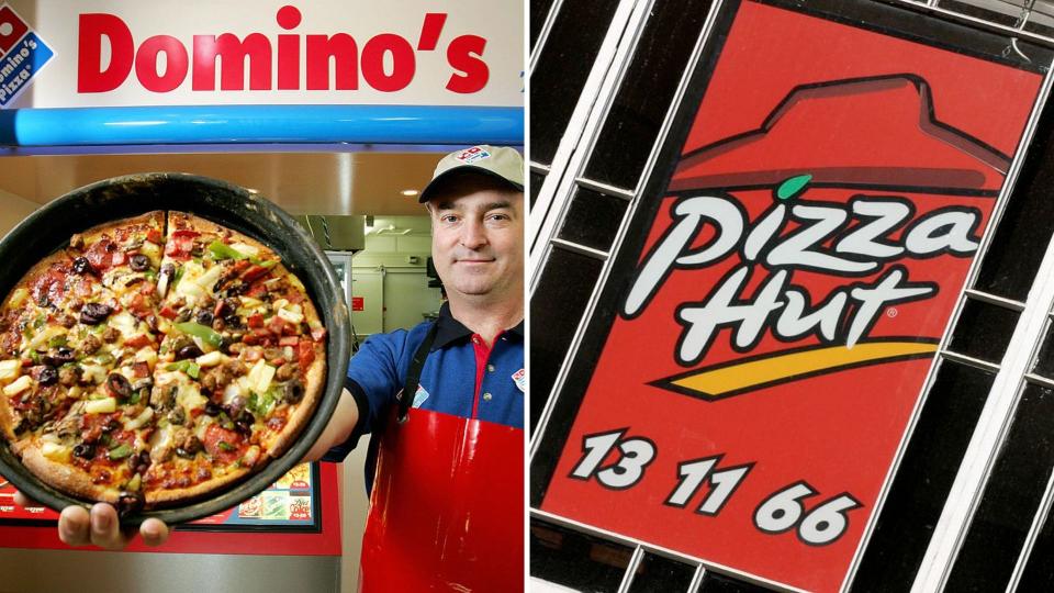 A Domino's worker holding up a pizza on the left, a Pizza Hut sign on the right.