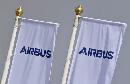 FILE PHOTO - Airbus branded flags are seen at Farnborough International Airshow in Farnborough, Britain, July 17, 2018. REUTERS/Toby Melville