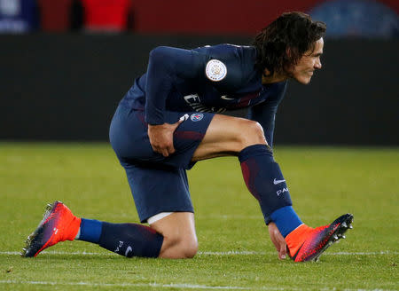 Football Soccer - Paris Saint-Germain v Rennes - French Ligue 1 - Parc des Princes, Paris, France - 6/11/16 Paris St Germain's Edison Cavani holds reacts during the match against Rennes. REUTERS/Jacky Naegelen