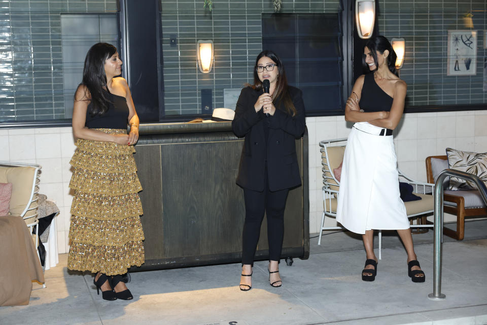 LOS ANGELES, CALIFORNIA - JUNE 13: (L-R) Karla Gallardo, Gina Rodriguez, and Shilpa Shah speak during the Cuyana Nuestra Raíces Dinner with Gina Rodriguez, María Elisa Camargo, Nathalie Kelley and Elsa Marie Collins at The Hoxton, Downtown LA on June 13, 2023 in Los Angeles, California. (Photo by Stefanie Keenan/Getty Images for Cuyana)