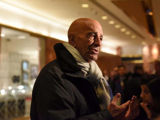 Tom Barrack speaks with members of the press at Trump Tower in 2017 (REUTERS)