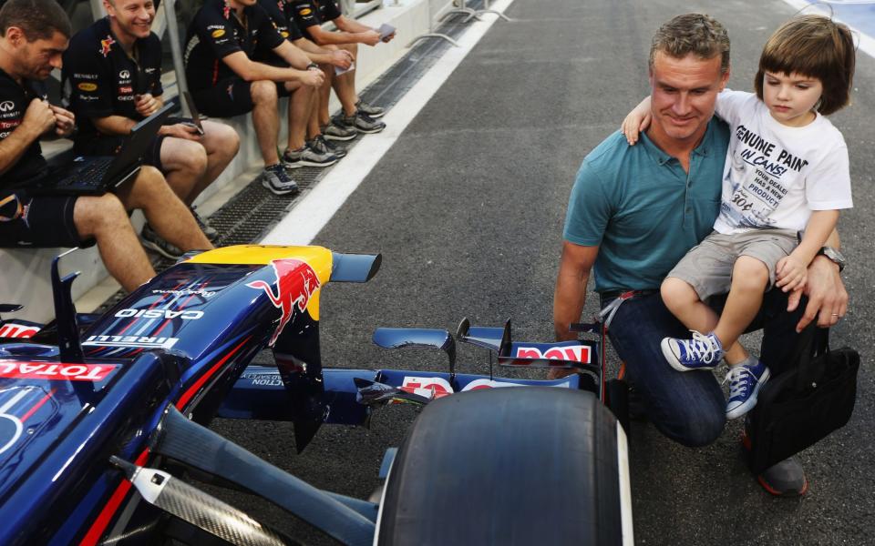 A devoted family man (pictured here with Dayton in 2012), Coulthard says he always felt there was more to life than racing