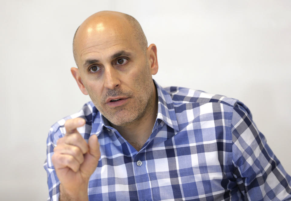 FILE - In this Monday, May 2, 2016, file photo, Jet.com CEO Marc Lore speaks during an interview in Hoboken, N.J. Wal-Mart’s acquisition of Jet.com is accelerating its progress in e-commerce as it works to narrow the gap between itself and online leader Amazon. Wal-Mart is betting its online future on essentials like produce and groceries and has adjusted its shipping strategy. But Amazon keeps innovating too. (AP Photo/Seth Wenig, File)