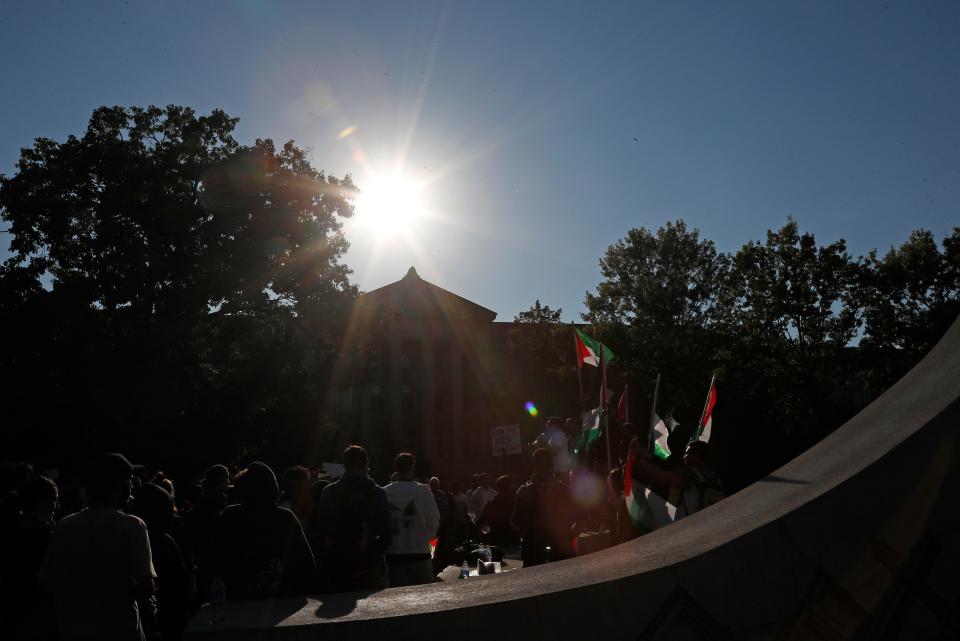 Demonstrators gather in response to the Palestine and Israel conflict, Thursday, Oct. 12, 2023, at Purdue University in West Lafayette, Ind.