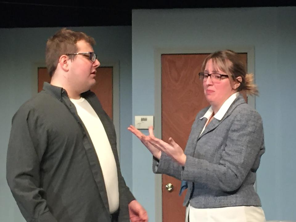 Duncan Hike and Hannah Oberlin, playing Karen Brown, fight their attraction to each other in "Unnecessary Farce."