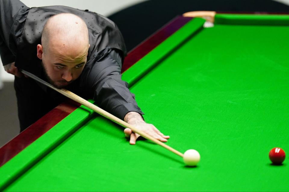 Belgium’s Luca Brecel stunned the seven-time world champion in the Crucible quarter-finals (PA)