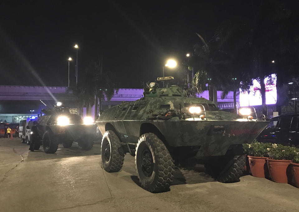 <p>Military vehicles are positioned outside the Resorts World Manila complex early Friday, June 2, 2017, in Manila, Philippines. (Photo: Bullit Marquez/AP) </p>