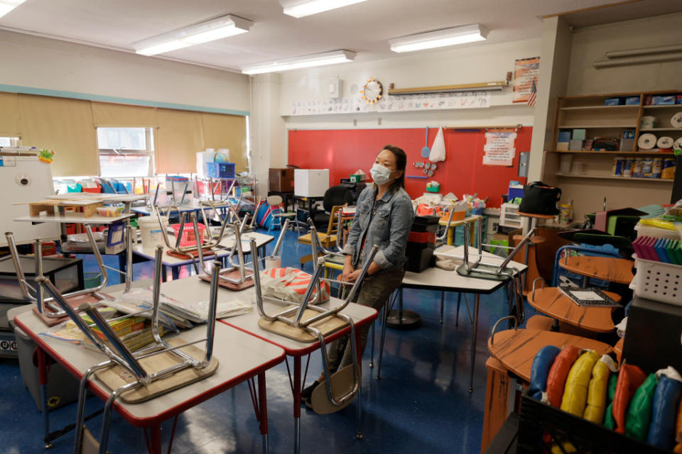 Laura Lai, teacher at Yung Wing School P.S. 124, surveys her classroom in September 2021. (Michael Loccisano/Getty Images)