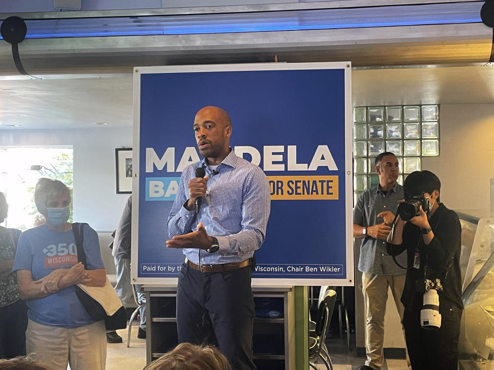 Democratic Lt. Gov. Mandela Barnes meets with supporters at Monty's Blue Plate Diner in Madison, Wis., Tuesday, Oct. 4, 2022, during a statewide tour highlighting his opponent's history opposing abortion rights. (AP Photo/Harm Venhuizen)