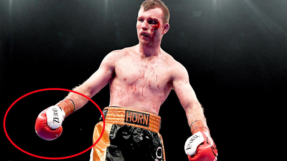 Jeff Horn, pictured here wearing Michael Zerafa's gloves.