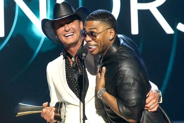 <p>FOX</p> Tim McGraw and Nelly at the ACM Honors