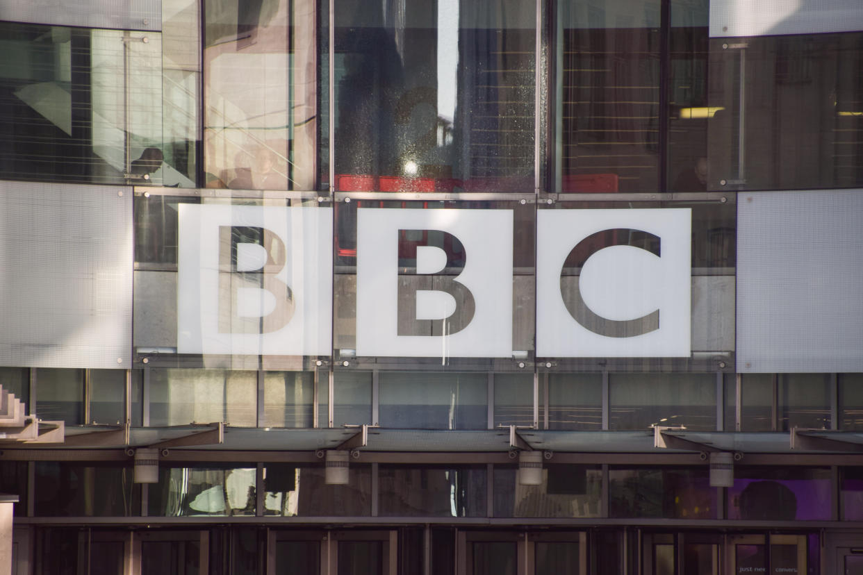 The BBC logo is seen at the entrance at Broadcasting House, the BBC headquarters in central London.The UK government has announced it will freeze the broadcaster's budget for the next two years and will end the license fee in 2027. (Photo by Vuk Valcic/SOPA Images/LightRocket via Getty Images)