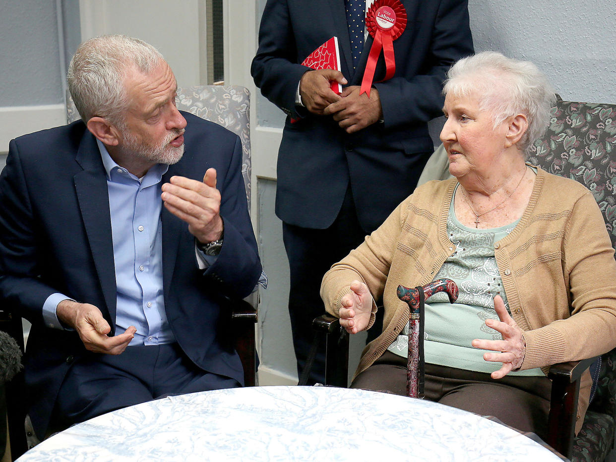 Jeremy Corbyn visits a community hub for older people in Bedford earlier this month: PA