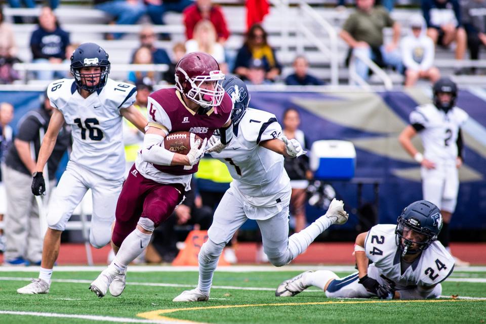 O'Neill's Marek Arbogast drives across field during the Section 9 class C championship football game in Newburgh, NY on Saturday, November 12, 2022. O'Neill defeated Burke 42-0. KELLY MARSH/FOR THE TIMES HERALD-RECORD