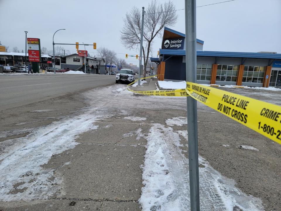 Police tape marks off the location of the Tuesday shooting in downtown Prince George, B.C. (Jason Peters/CBC - image credit)