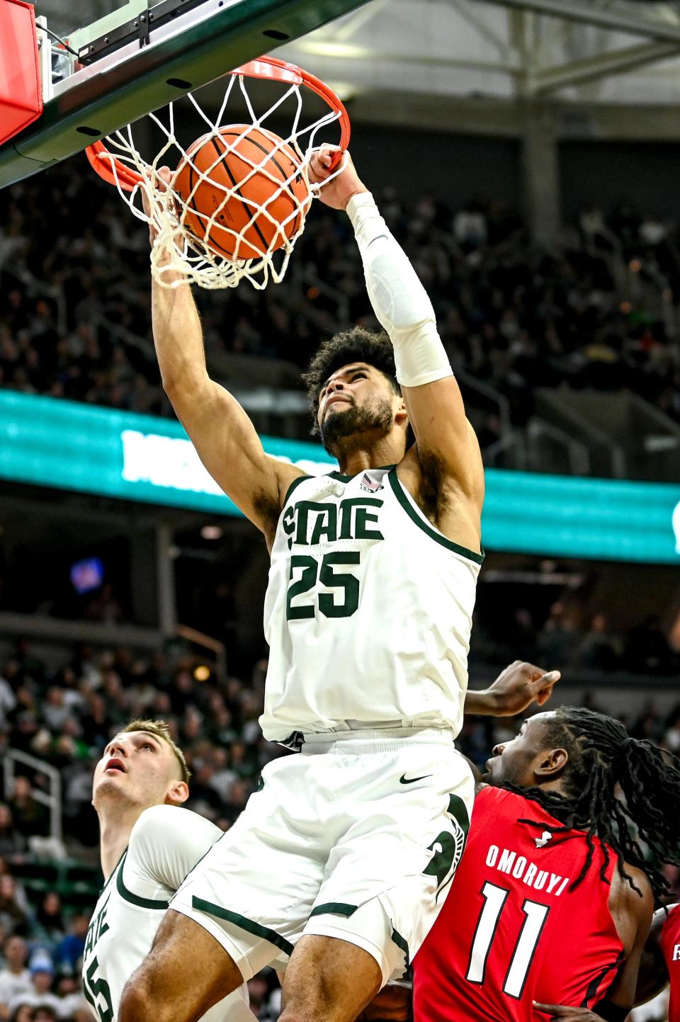 Michigan State's Malik Hall dunks against Rutgers during the second half on Sunday, Jan. 14, 2024, at the Breslin Center in East Lansing.