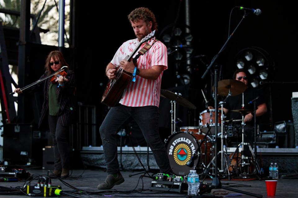 Jon Stickley of the Jon Stickley Trio performs Thursday, April 21, 2022 at the Riverfront Plaza in Jacksonville.