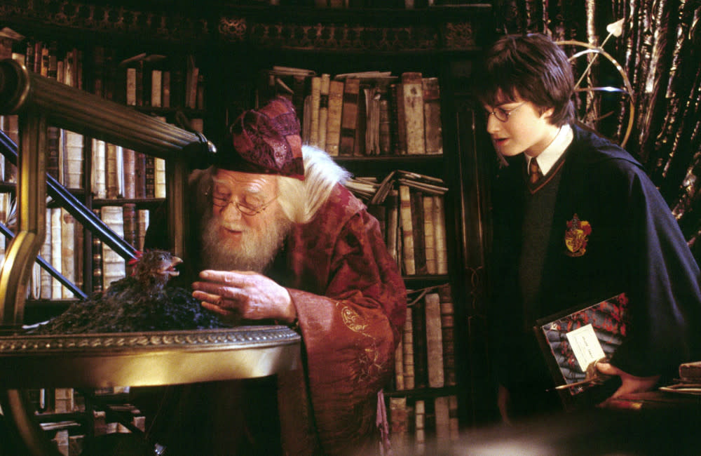 Richard Harris and Daniel Radliffe - NOV 22 - Famous - Dumbledore and Harry Potter