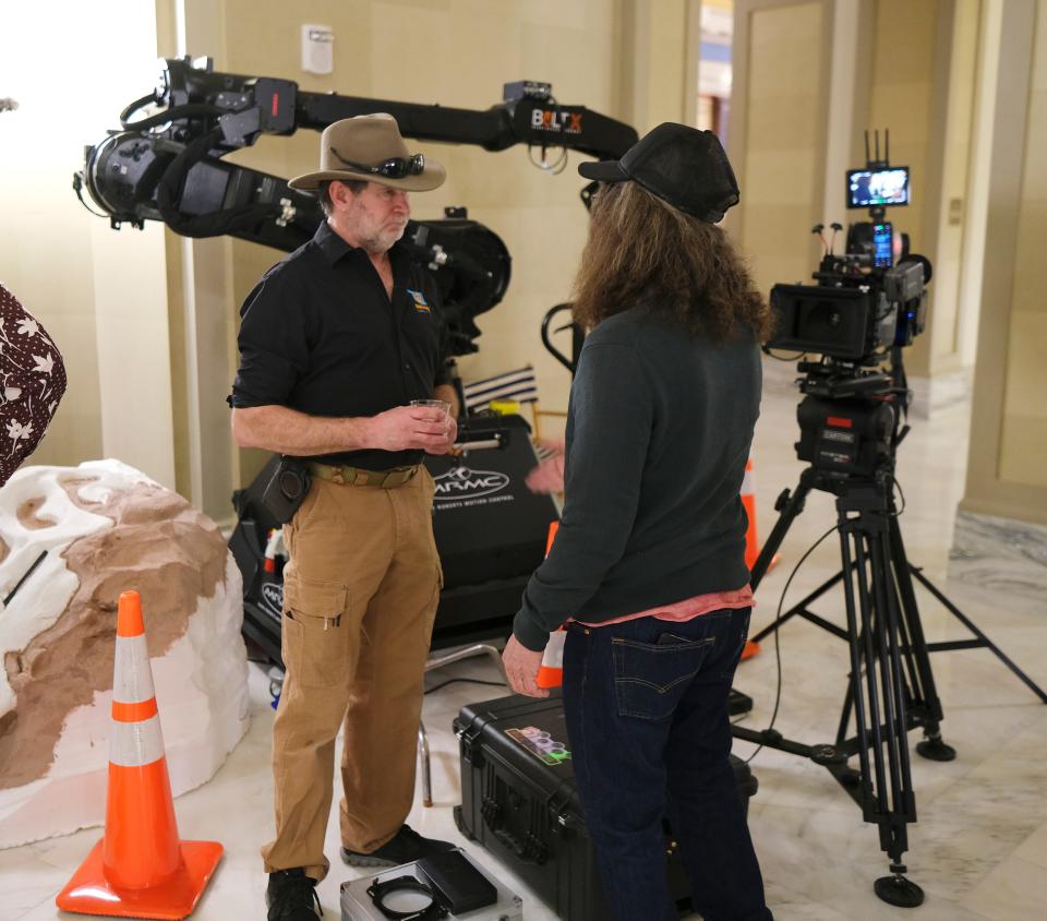 Jon Shryock, co-founder of OKC's Shryock Fabrications, talks about his company's Bolt X high-speed motion-control robotic arm during Oklahoma Film Day at the Capitol, Tuesday, February 28, 2023.