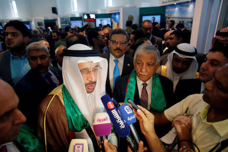 The Iraqi and the Saudi oil ministers Jabar al-Luaibi and Khalid al-Falih address a news conference in Baghdad International Exhibition, Baghdad, Iraq October 21, 2017. REUTERS/Khalid al-Mousily
