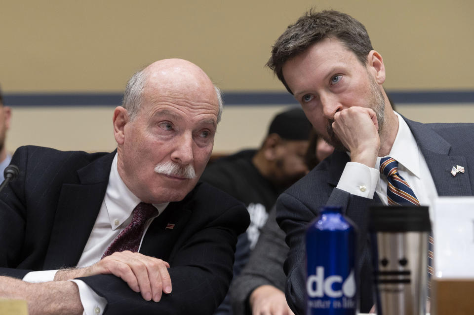 Washington, D.C Council Chairman Phil Mendelson, left, talks with Council member Charles Allen while they testify during the House Oversight and Accountability Committee's hearing about Congressional oversight of D.C., on Capitol Hill, Wednesday, March 29, 2023. (AP Photo/Cliff Owen)