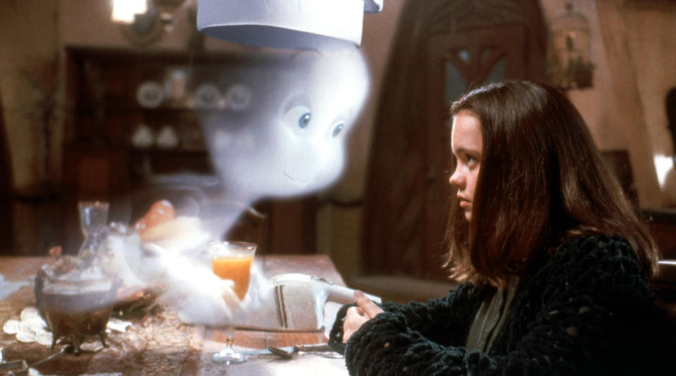 Casper sits at a table talking to Christina Ricci