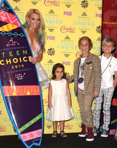 <p>Steve Granitz/WireImage</p> Britney Spears poses with Maddie Briann Aldridge, Sean Preston Federline, and Jayden James Federline in the press room at the 2015 Teen Choice Awards.