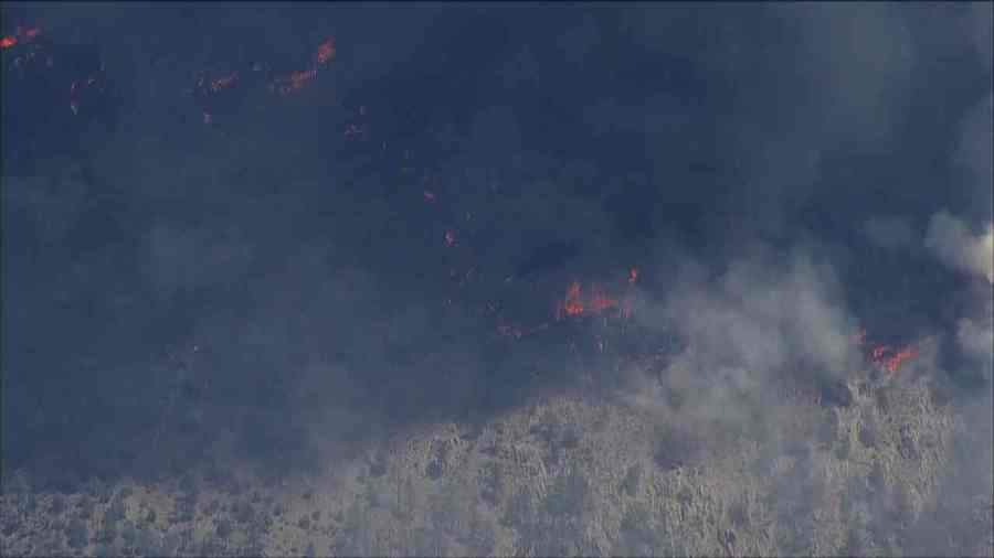 Flames are visible in the Alexander Mountain Fire from SkyFOX on July 29, 2024.
