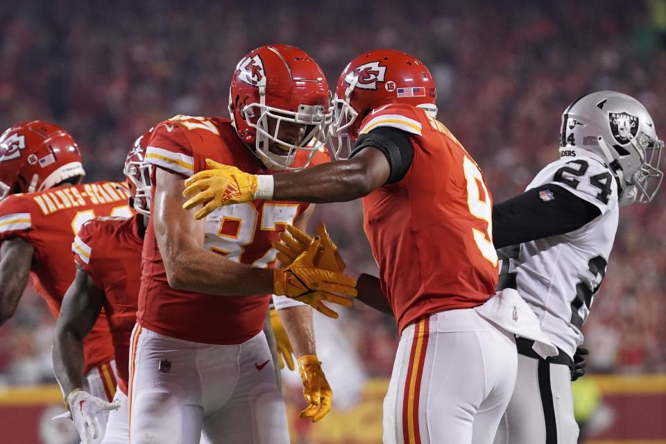 Kansas City Chiefs tight end Travis Kelce (87) celebrates one of his four touchdowns against the Raiders with JuJu Smith-Schuster.