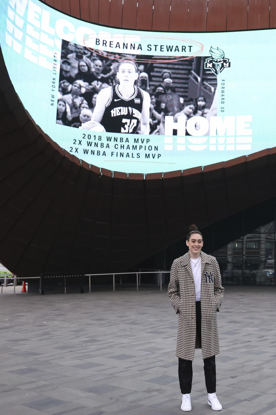 New York Liberty forward Breanna Stewart poses in front of Barclays Center before a WNBA basketball news conference, Thursday, Feb. 9, 2023, in New York. (AP Photo/Jessie Alcheh)