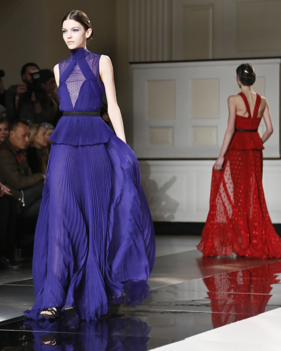 Fashion from the Fall 2013 collection of Jason Wu is modeled on Friday, Feb. 8, 2013 in New York. (AP Photo/Bebeto Matthews)