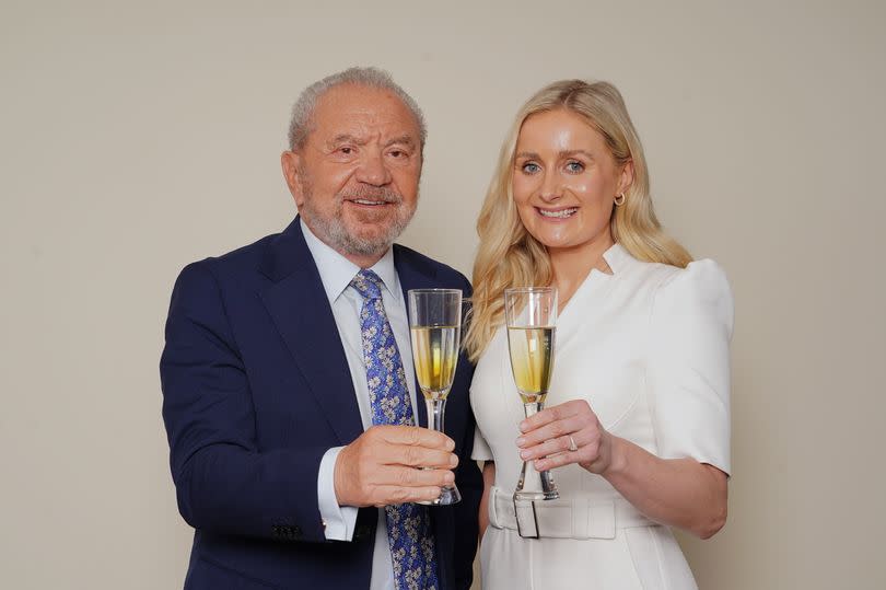 Rachel Woolford poses with Lord Alan Sugar after being crowned the winner of The Apprentice 2024