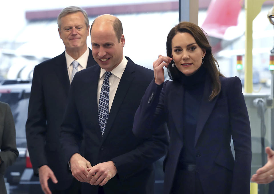 Britain's Prince William and Kate, Princess of Wales, arrive at Boston Logan International Airport, Wednesday, Nov. 30, 2022, in Boston. The Prince and Princess of Wales are making their first overseas trip since the death of Queen Elizabeth II in September.(John Tlumacki/The Boston Globe via AP, Pool)