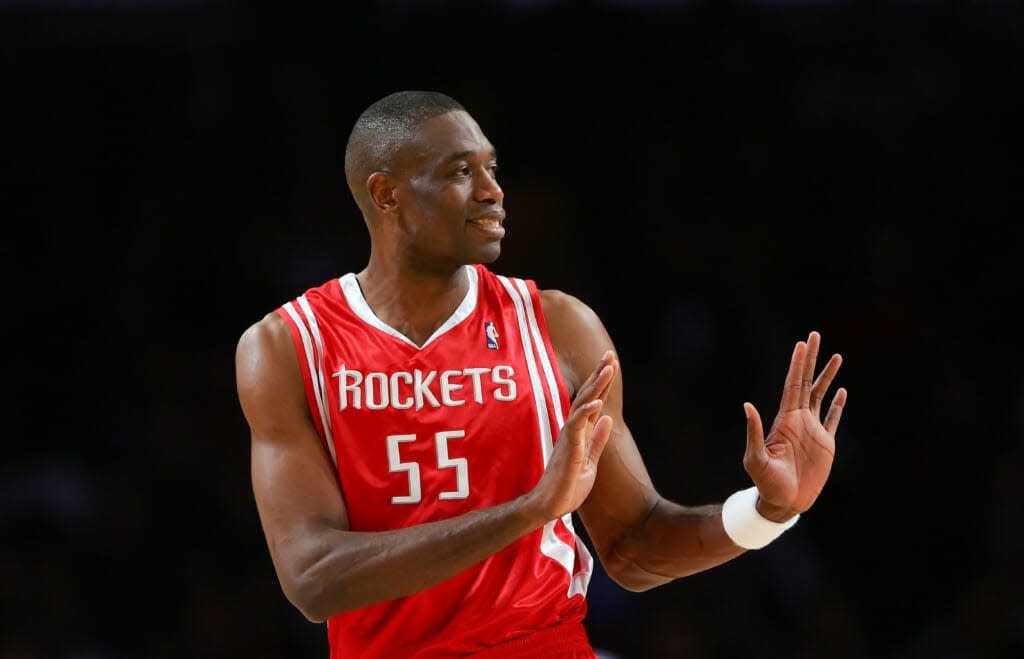 Dikembe Mutombo #55 of the Houston Rockets gestures during the game against the Los Angeles Lakers on December 15, 2006 at Staples Center in Los Angeles, California. The Lakers won 112-101. NOTE TO USER: User expressly acknowledges and agrees that, by downloading and or using this photograph, User is consenting to the terms and conditions of the Getty Images License Agreement. (Photo by Lisa Blumenfeld/Getty Images)