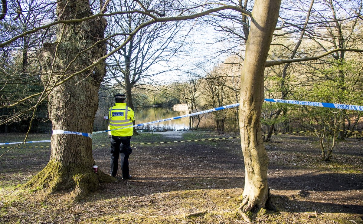 Metropolitan Police officers at the scene at the Wake Valley pond in Epping Forest following the discovery of Richard Okorogheye’s body. (PA Archive)