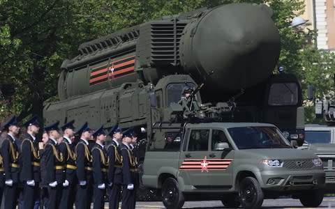 An Iskander ballistic missile rolls through Red Square during the Victory Day parade on May 9 - Credit: Mikhail Svetlov/Getty Images