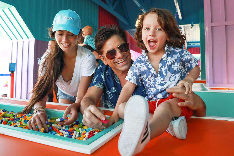 <p>John Stamos, wife Caitlin McHugh and their son Billy have fun at The Lego Movie World at Legoland California Resort on June 5 in Carlsbad, California.</p>