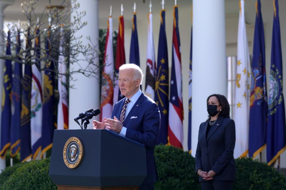 U.S. President Joe Biden speaks during an event on the American Rescue Plan as U.S. Vice President Kamala Harris listens in the Rose Garden of the White House on March 12, 2021 in Washington, DC.