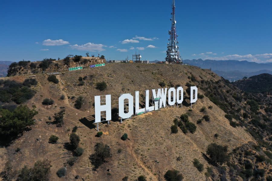 The Hollywood sign is seen as it is repainted in preparation for its 100th anniversary in 2023, in Hollywood on September 28, 2022. – A team of 10 painters will work eight weeks and use almost 400 gallons of paint as the iconic Tinsletown landmark gets a makeover ahead of it’s 100th anniversary in 2023. (Photo by Robyn Beck / AFP) (Photo by ROBYN BECK/AFP via Getty Images)