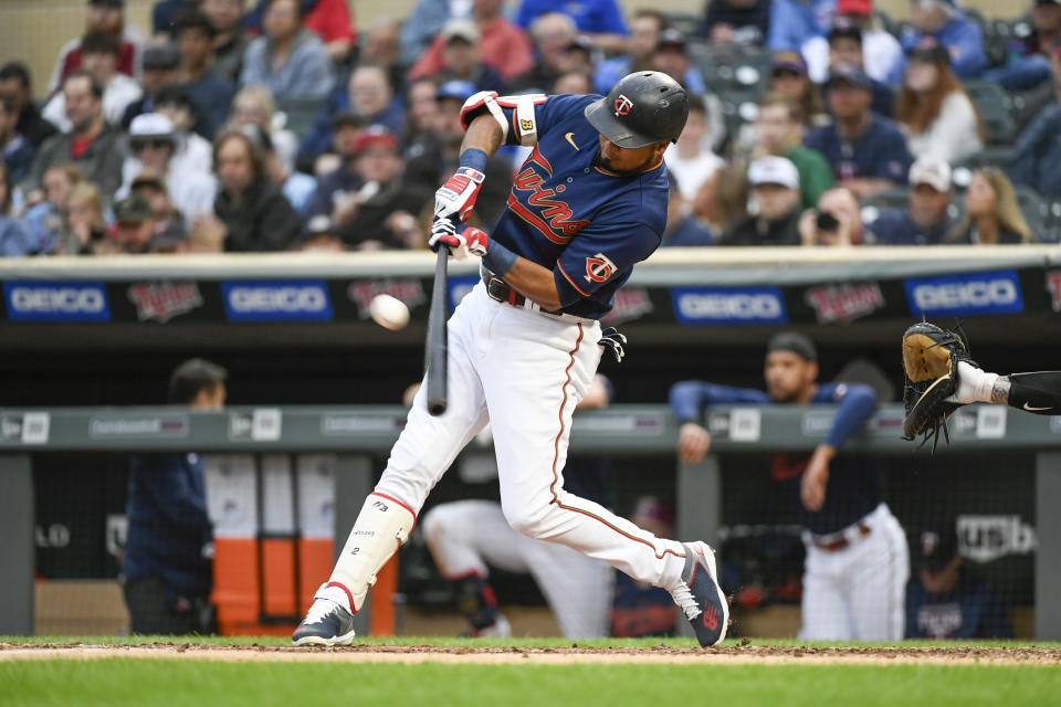 Minnesota Twins' Carlos Correa hits an RBI double against the Detroit Tigers during the third inning of a baseball game Tuesday, May 24, 2022, in Minneapolis. (AP Photo/Craig Lassig)