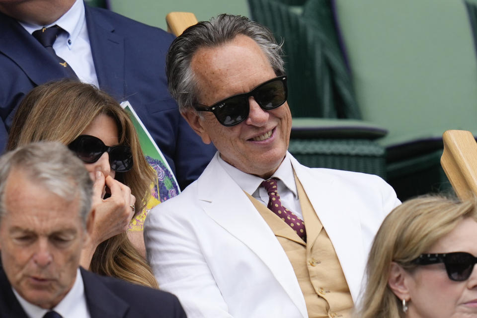 Richard E Grant waits on Centre Court ahead of the quarterfinal match Elena Rybakina of Kazakhstan and Elina Svitolina of Ukraine at the Wimbledon tennis championships in London, Wednesday, July 10, 2024. (AP Photo/Kirsty Wigglesworth)