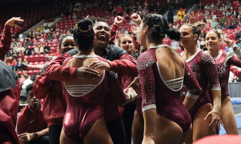 Mar 8, 2024; Tuscaloosa, Alabama, USA; Teammates celebrate with Lisa Blanco after her 10 on the vault during a quad meet with Illinois, Minnesota, and Talladega at Coleman Coliseum.