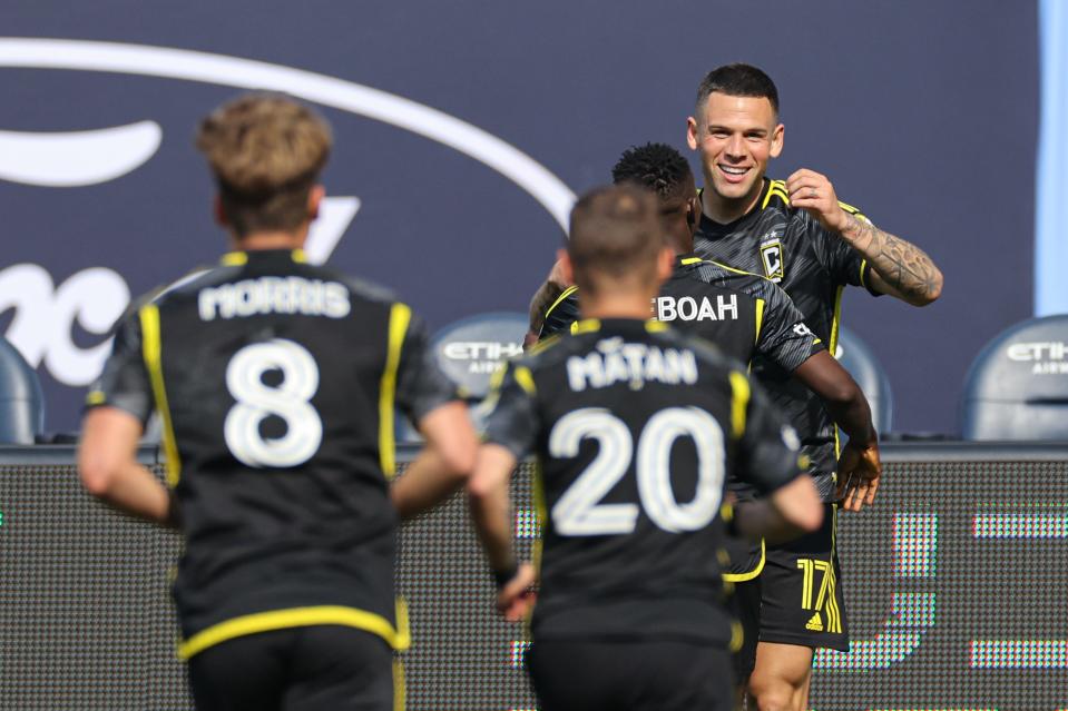 Crew forward Christian Ramirez (17) celebrates his goal with teammates during the second half against New York City FC.