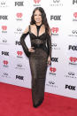 <p>Becky G looked like a gothic goddess in this figure-flattering leopard black dress with black details around the bust. </p>