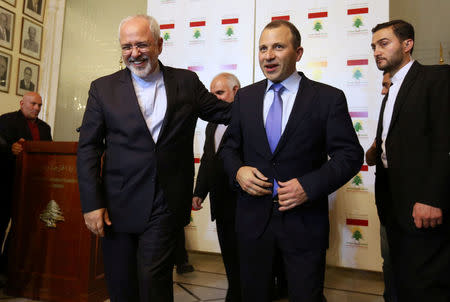 Iran's Foreign Minister Mohammad Javad Zarif (L) walks with Lebanese Foreign Minister Gebran Bassil in Beirut, Lebanon November 7, 2016. REUTERS/Aziz Taher