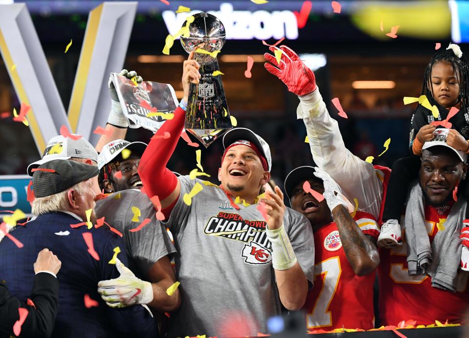 Patrick Mahomes hoists the Vince Lombardi Trophy after the Kansas City Chiefs defeated the San Francisco 49ers in Super Bowl LIV at Hard Rock Stadium on Feb. 2, 2020.
