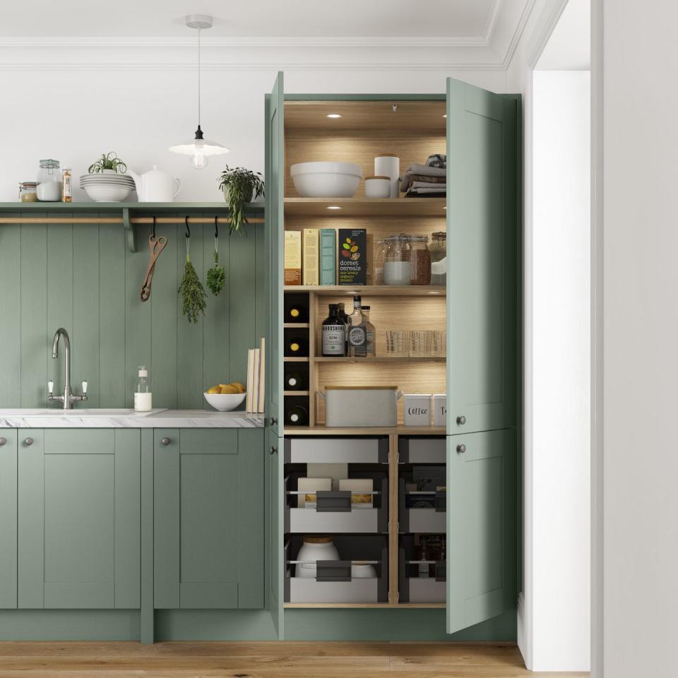 <p>Fresh and muted, this sage <a href="https://www.housebeautiful.com/uk/decorate/kitchen/g36699206/green-kitchen/" rel="nofollow noopener" target="_blank" data-ylk="slk:green kitchen;elm:context_link;itc:0;sec:content-canvas" class="link ">green kitchen</a> larder draws upon soft, botanical shades found in the natural world. With a calming feel, shades of sage work particularly well in country kitchen schemes that are flooded with light. </p><p>• Sherwood Larder in Sage Green from <a href="https://www.benchmarxkitchens.co.uk/" rel="nofollow noopener" target="_blank" data-ylk="slk:Benchmarx Kitchens;elm:context_link;itc:0;sec:content-canvas" class="link ">Benchmarx Kitchens</a></p>