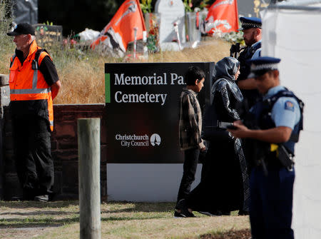 Relatives and other people arrive to attend the burial ceremony of the victims of the mosque attacks, at the Memorial Park Cemetery in Christchurch, New Zealand March 20, 2019. REUTERS/Jorge Silva